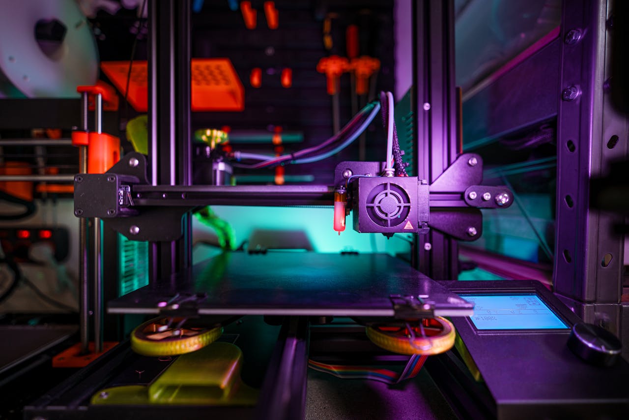 services-04 Close-up shot of a modern 3D printer in a laboratory setting, showcasing innovation and technology.